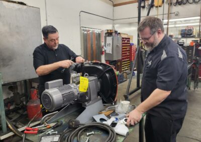 NWP Service team assembling Abaque Pump; industrial fabrication