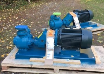 An industrial pump prepped for delivery on a pallet