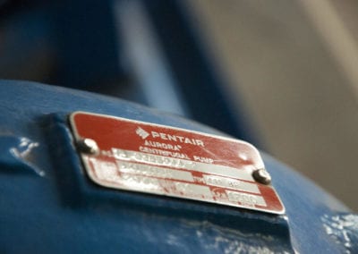 Close up photo of a PENTAIR tag