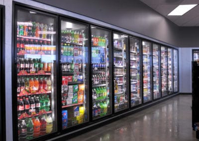 Photo of a convenience store cooler and drinks